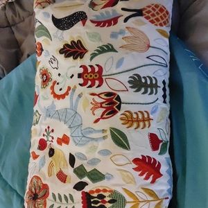 Pillow with hand stitching